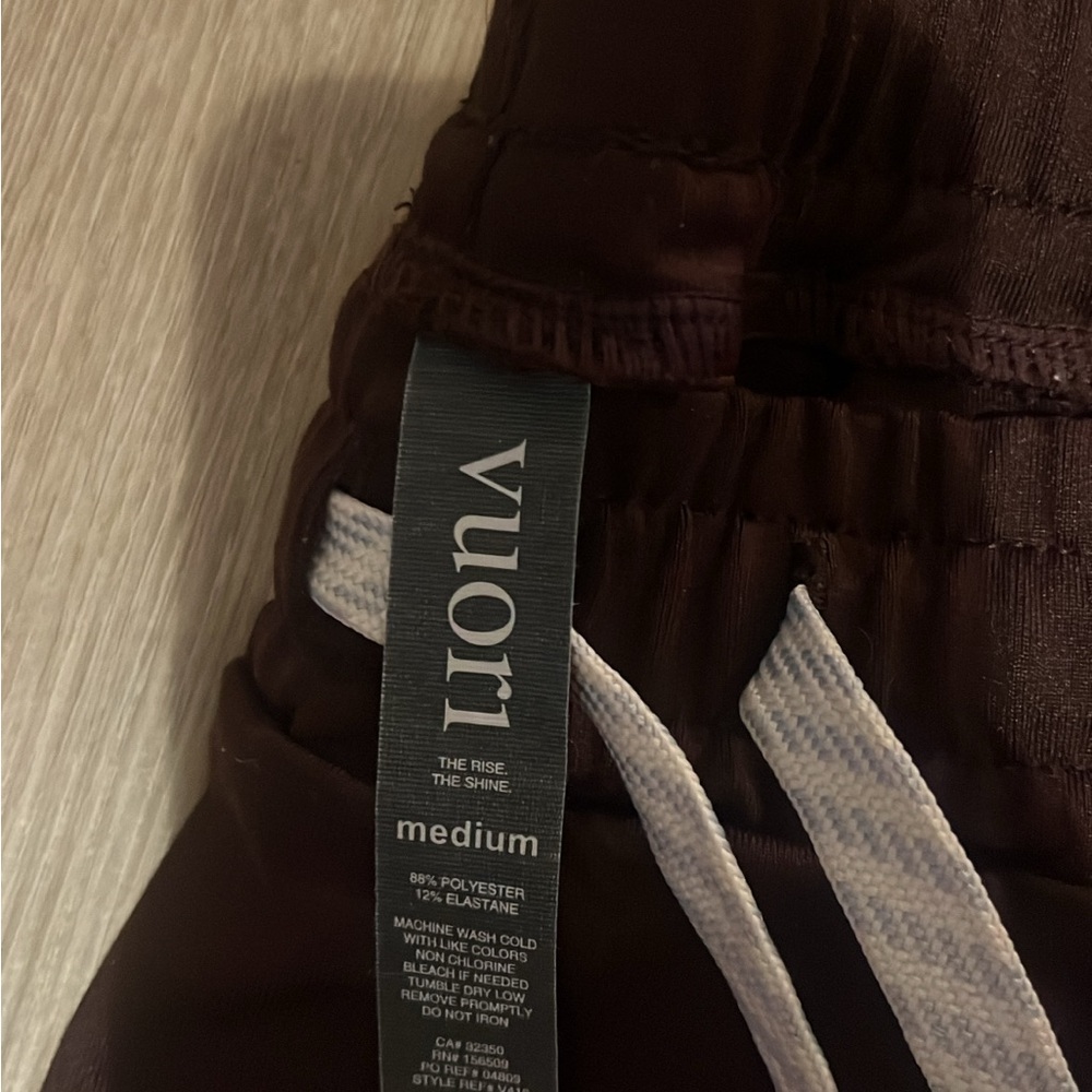 Vuori Men's Sunday Performance Joggers in a brown/oxblood color. - Picture 5 of 5